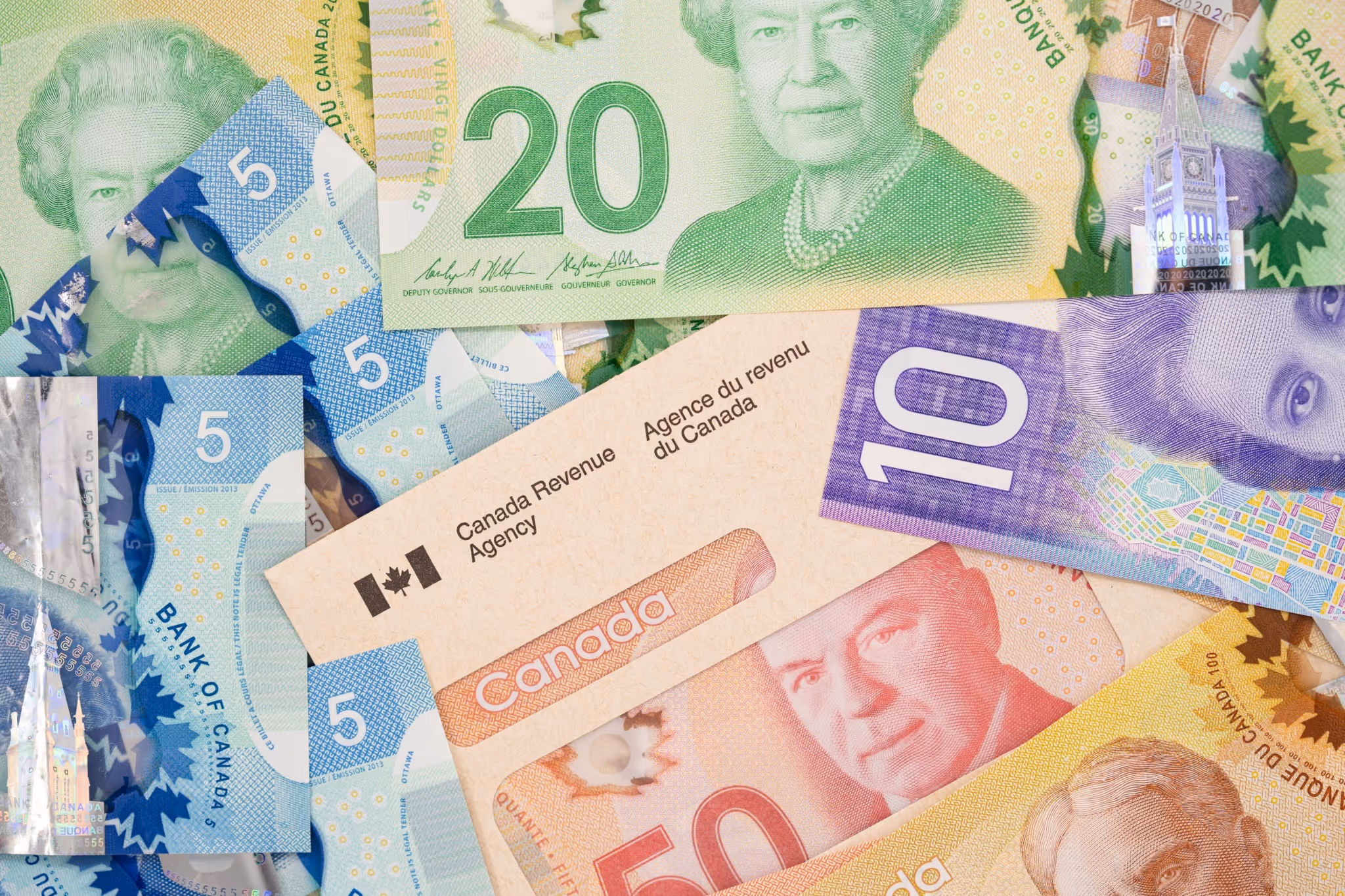 Canadians receiving lots of government benefit payments in June